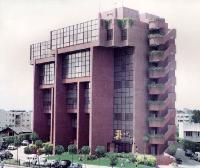 this photograph was taken soon after the building was completed. today the tress in front have grown so tall that a complete view of the building cannot be had!